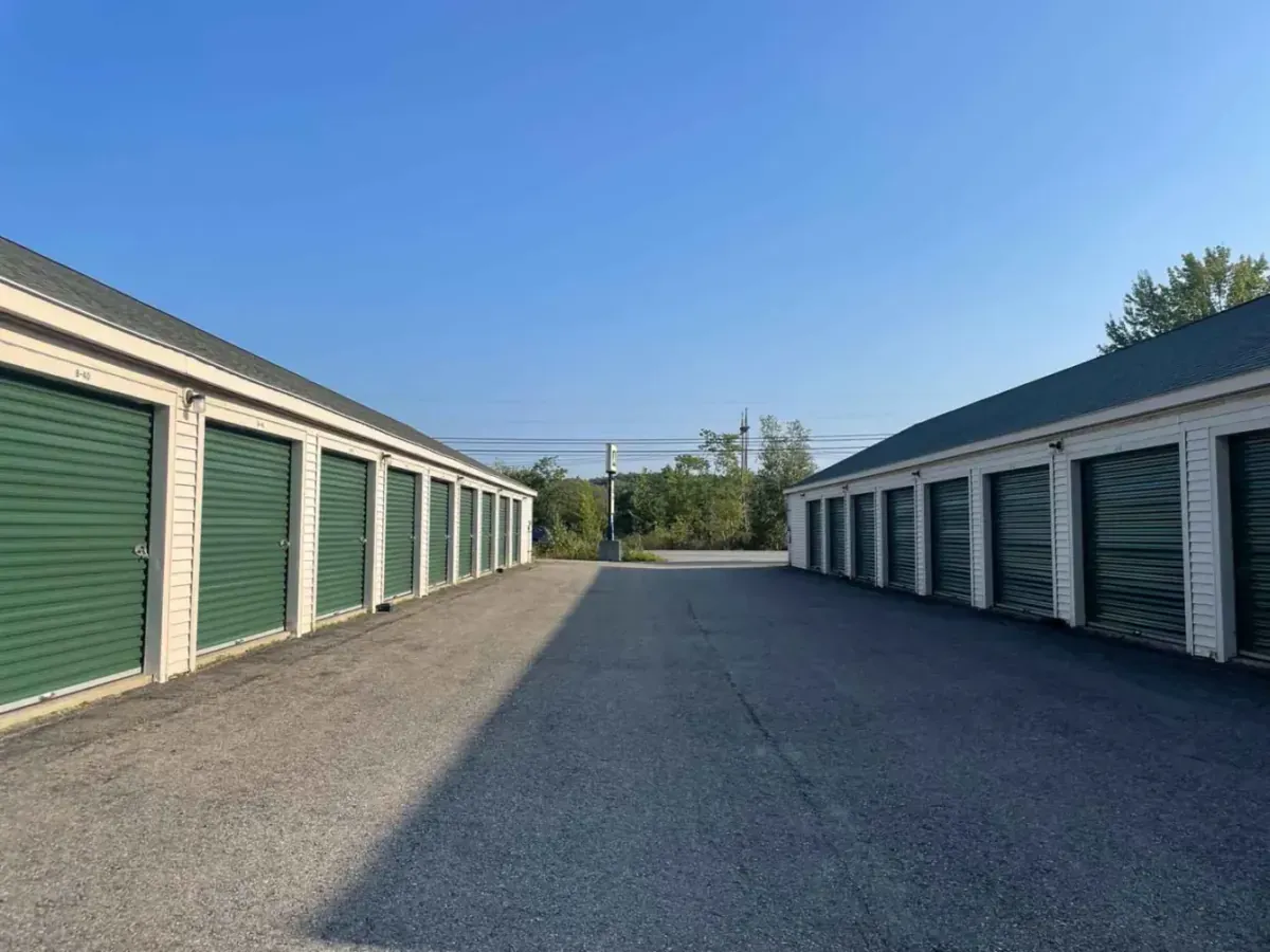 A row of storage units and a sign.