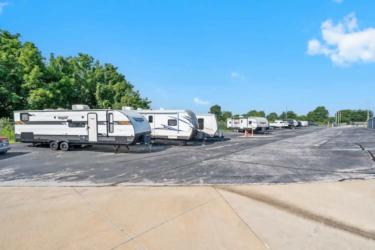 RVs parked in parking spots at Nixa 40th.