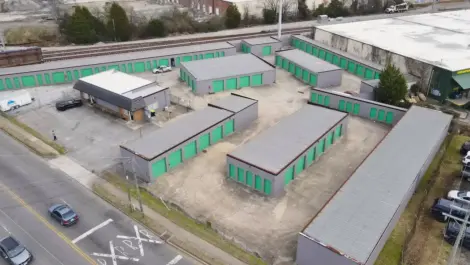 Aerial view of a self-storage facility with multiple outdoor units and drive-up lanes
