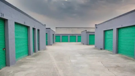 Group of outdoor storage units with drive-up access.