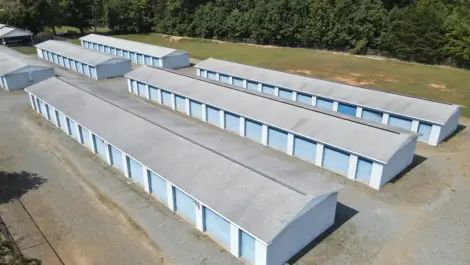 Aerial view of outdoor storage units arranged in rows.