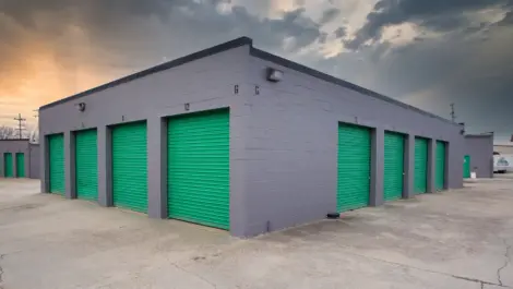 Multiple outdoor storage units with drive-up access and metal roll-up doors