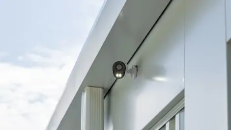 Security camera angled to monitor the storage facility.